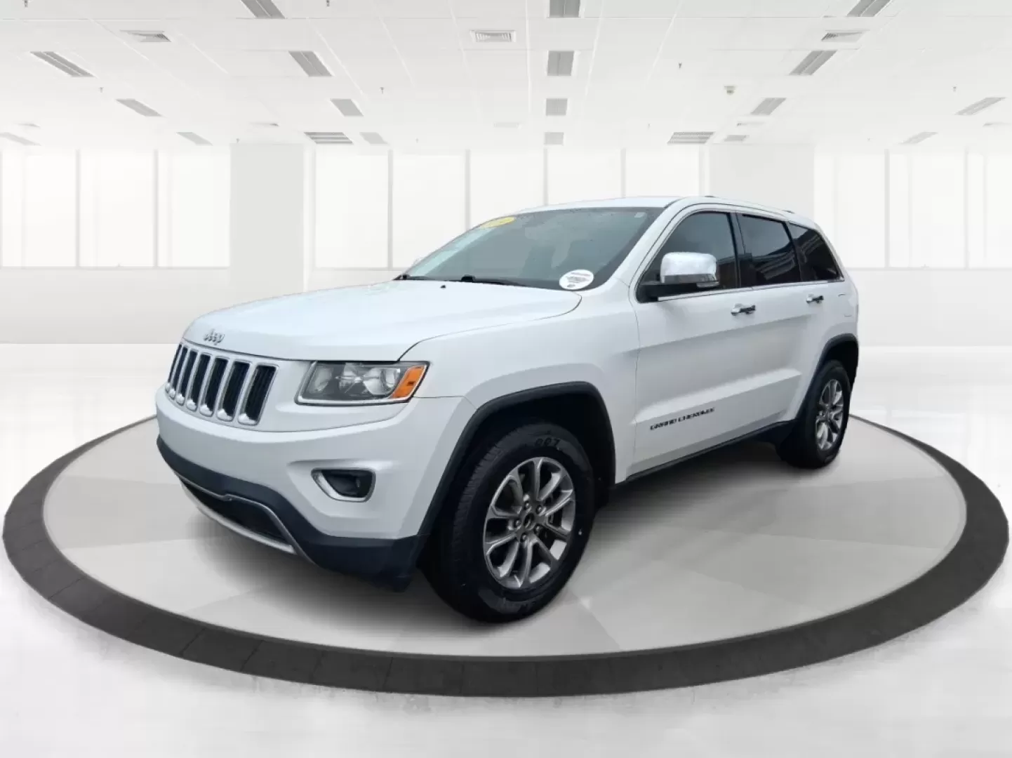 2014 Jeep Grand Cherokee Limited (1C4RJEBG2EC) with an Other engine, located at 8750 N County Rd 25A, Piqua, OH, 45356, (937) 908-9800, 40.164391, -84.232513 - **Unleash Adventure with the 2014 Jeep Grand Cherokee Limited at Advantage Car and Credit - Piqua!**<br /> <br /> Are you ready to elevate your driving experience? The 2014 Jeep Grand Cherokee Limited is the perfect vehicle for those who crave both adventure and comfort. Whether you're taking the fa - Photo#8