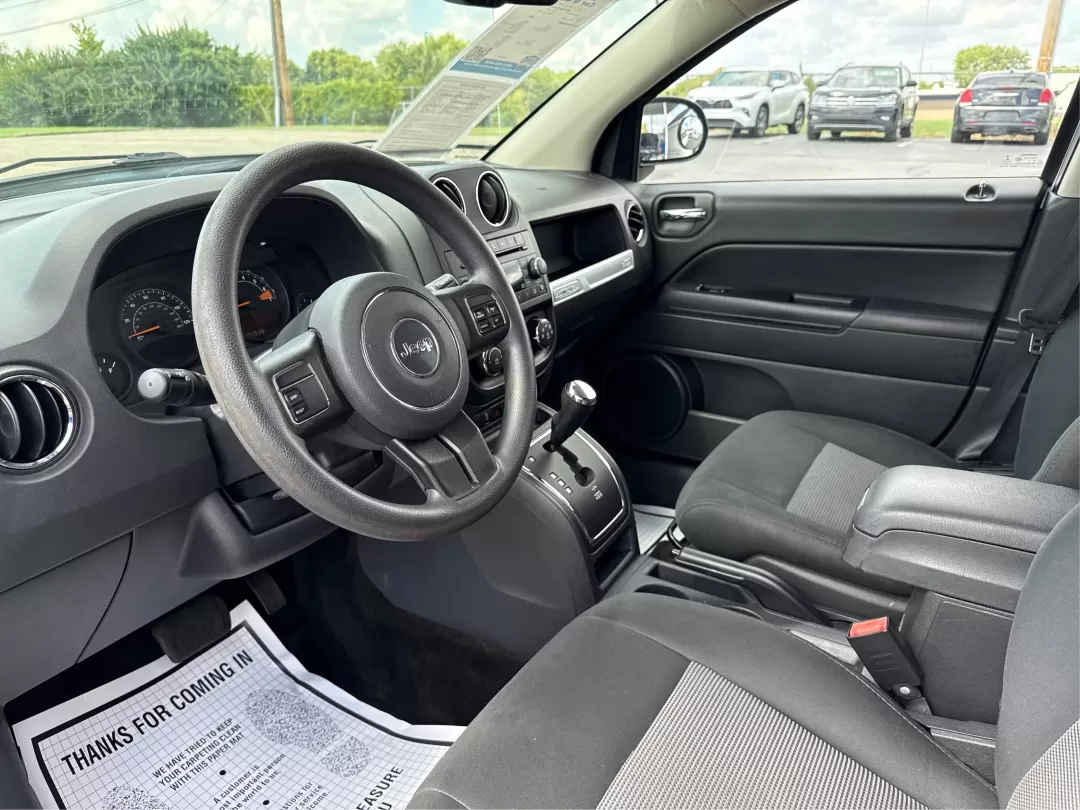 2014 Jeep Compass Sport (1C4NJDBB4ED) with an 2.4L I-4 DOHC engine, located at 1230 East Main St, Xenia, OH, 45385, (937) 908-9800, 39.688026, -83.910172 - Photo#9
