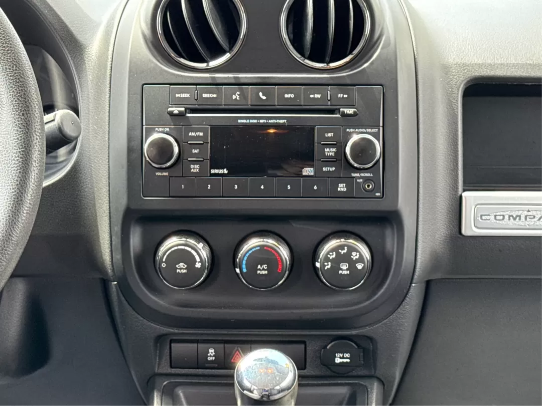 2014 Jeep Compass Sport (1C4NJDBB4ED) with an 2.4L I-4 DOHC engine, located at 1230 East Main St, Xenia, OH, 45385, (937) 908-9800, 39.688026, -83.910172 - Photo#13