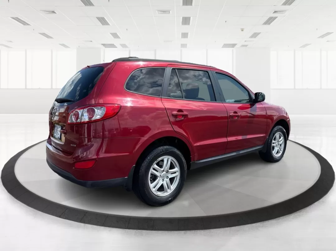 2012 Hyundai Santa Fe GLS (5XYZGDAB0CG) with an 2.4L I-4 DOHC engine, located at 4508 South Dixie Dr, Moraine, OH, 45439, (937) 908-9800, 39.689976, -84.218452 - 2012 Hyundai Santa Fe GLS - Photo#2