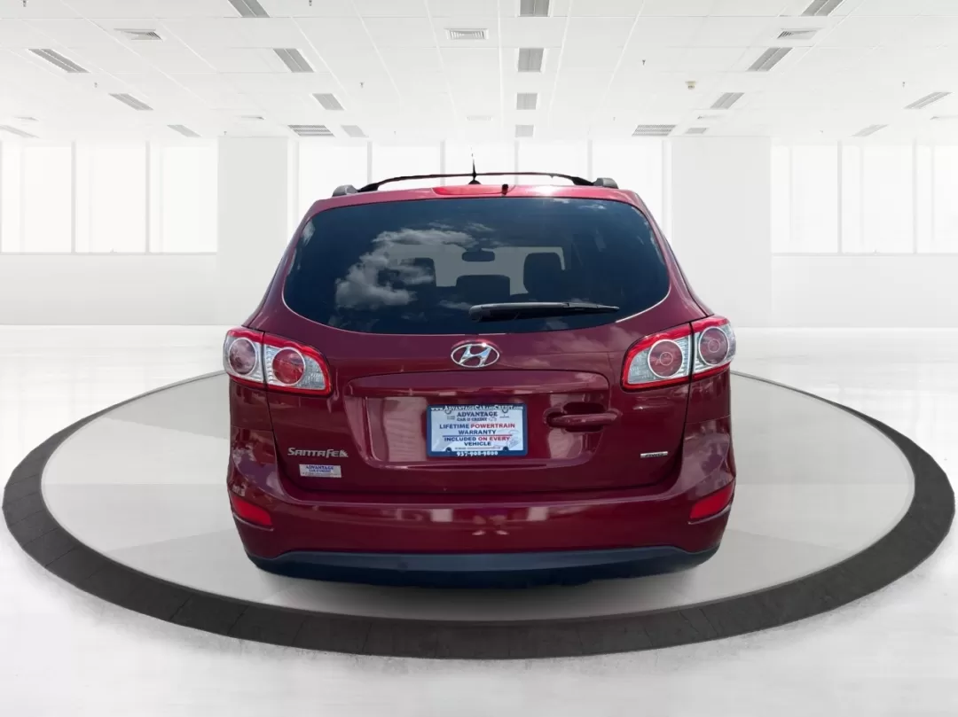 2012 Hyundai Santa Fe GLS (5XYZGDAB0CG) with an 2.4L I-4 DOHC engine, located at 4508 South Dixie Dr, Moraine, OH, 45439, (937) 908-9800, 39.689976, -84.218452 - 2012 Hyundai Santa Fe GLS - Photo#3