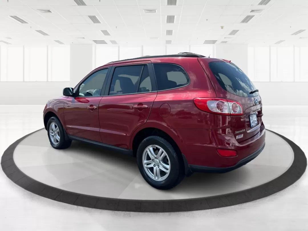 2012 Hyundai Santa Fe GLS (5XYZGDAB0CG) with an 2.4L I-4 DOHC engine, located at 4508 South Dixie Dr, Moraine, OH, 45439, (937) 908-9800, 39.689976, -84.218452 - 2012 Hyundai Santa Fe GLS - Photo#4