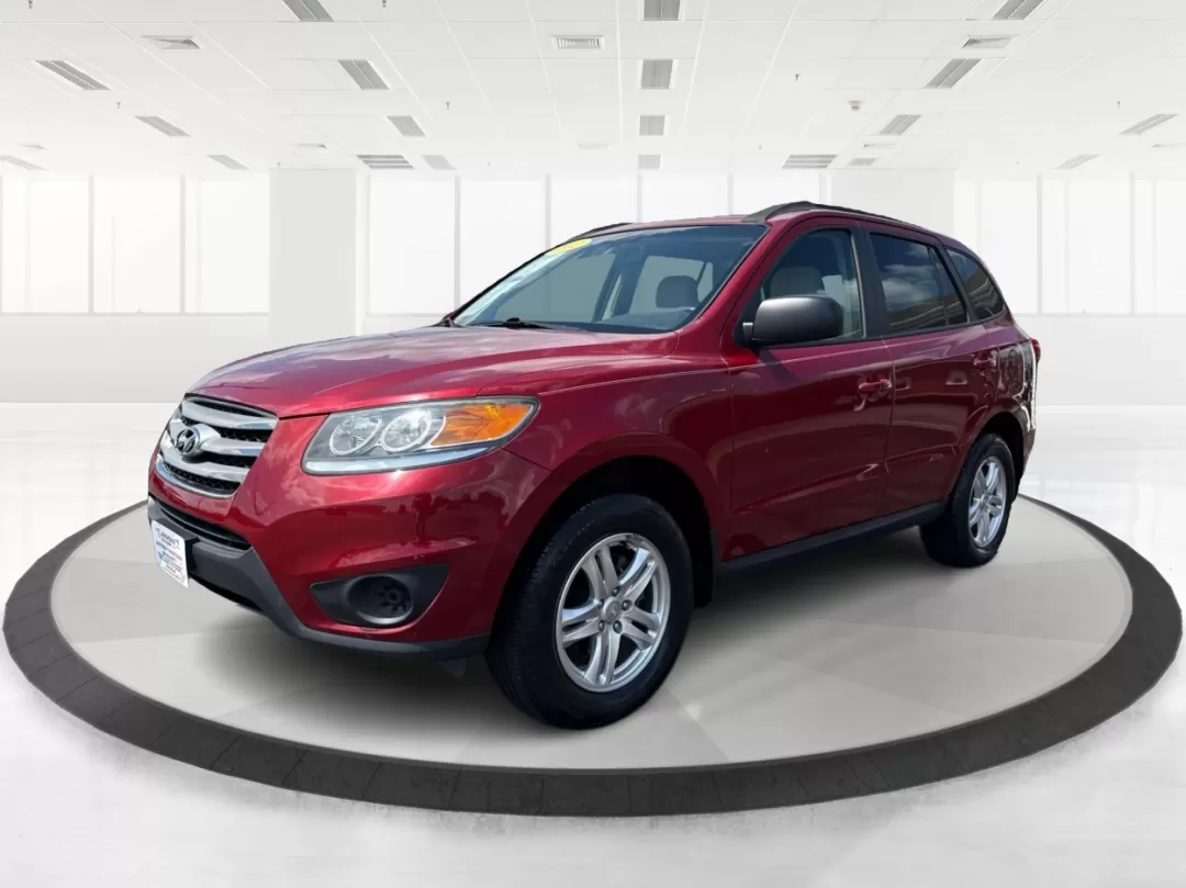 2012 Hyundai Santa Fe GLS (5XYZGDAB0CG) with an 2.4L I-4 DOHC engine, located at 4508 South Dixie Dr, Moraine, OH, 45439, (937) 908-9800, 39.689976, -84.218452 - 2012 Hyundai Santa Fe GLS - Photo#8