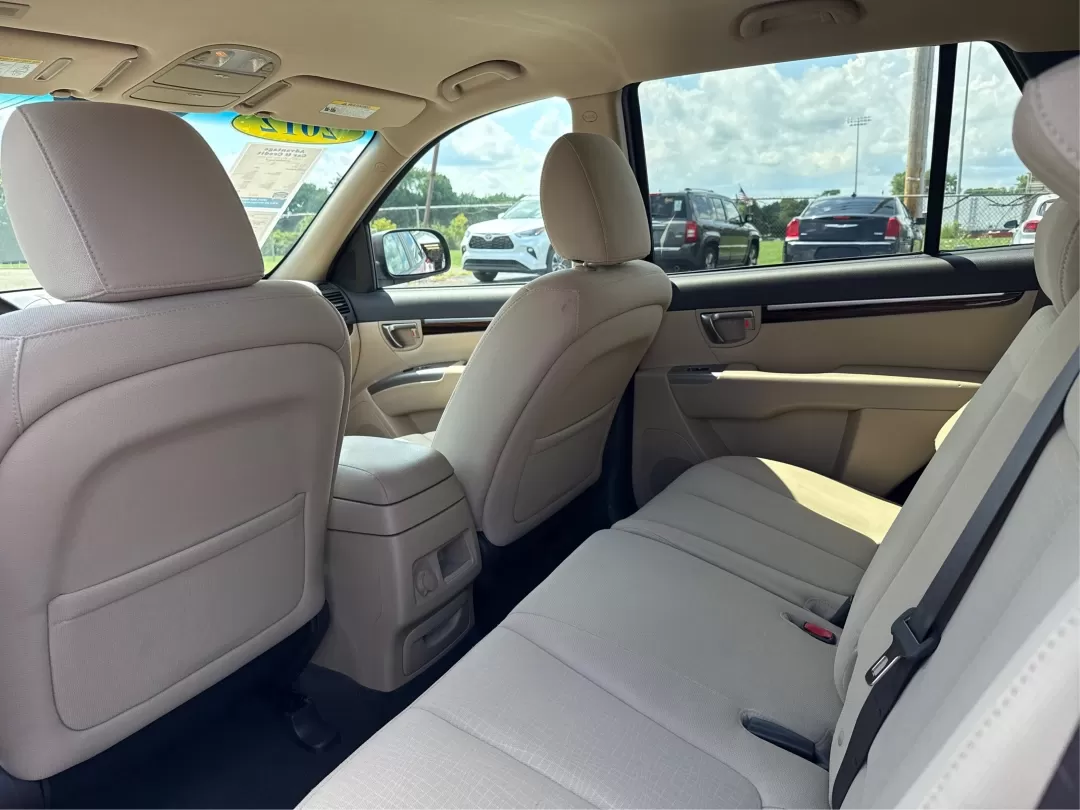 2012 Hyundai Santa Fe GLS (5XYZGDAB0CG) with an 2.4L I-4 DOHC engine, located at 4508 South Dixie Dr, Moraine, OH, 45439, (937) 908-9800, 39.689976, -84.218452 - 2012 Hyundai Santa Fe GLS - Photo#10