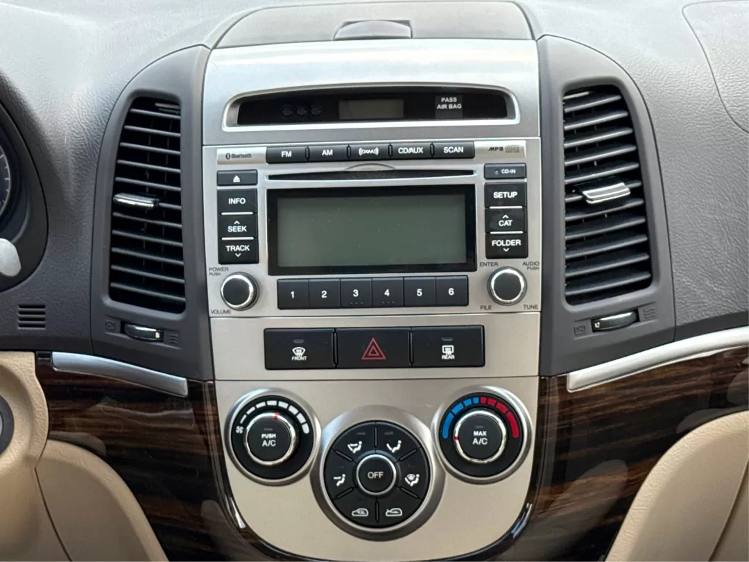 2012 Hyundai Santa Fe GLS (5XYZGDAB0CG) with an 2.4L I-4 DOHC engine, located at 4508 South Dixie Dr, Moraine, OH, 45439, (937) 908-9800, 39.689976, -84.218452 - 2012 Hyundai Santa Fe GLS - Photo#13