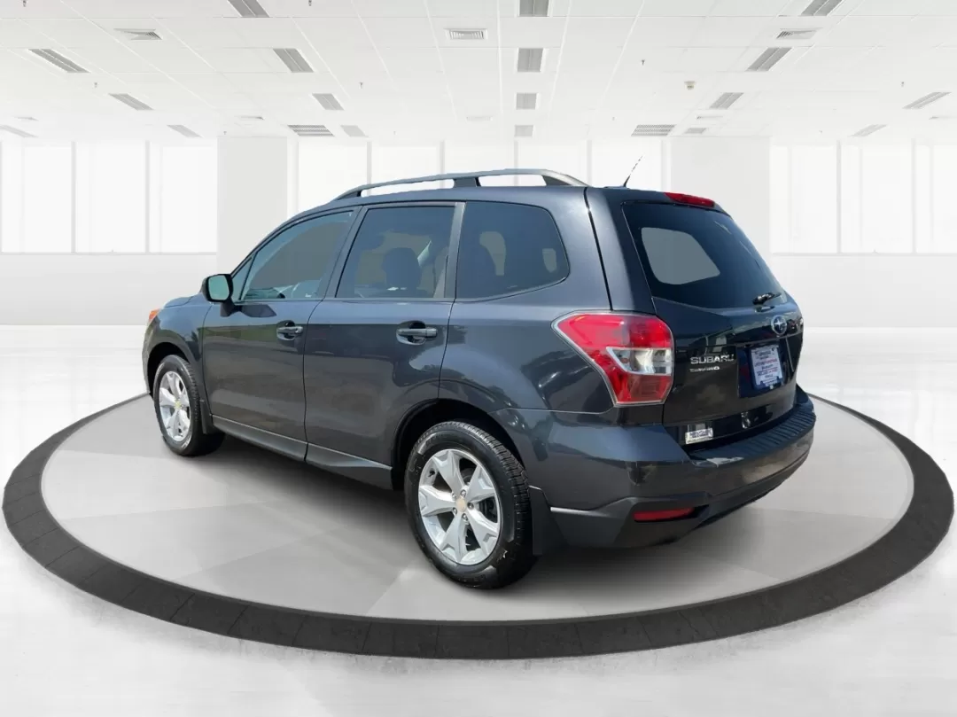 2014 Subaru Forester 2.5i Premium (JF2SJAGCXEH) with an 2.5L H-4 DOHC engine, located at 4508 South Dixie Dr, Moraine, OH, 45439, (937) 908-9800, 39.689976, -84.218452 - 2014 Subaru Forester 2.5i Premium - Photo#4