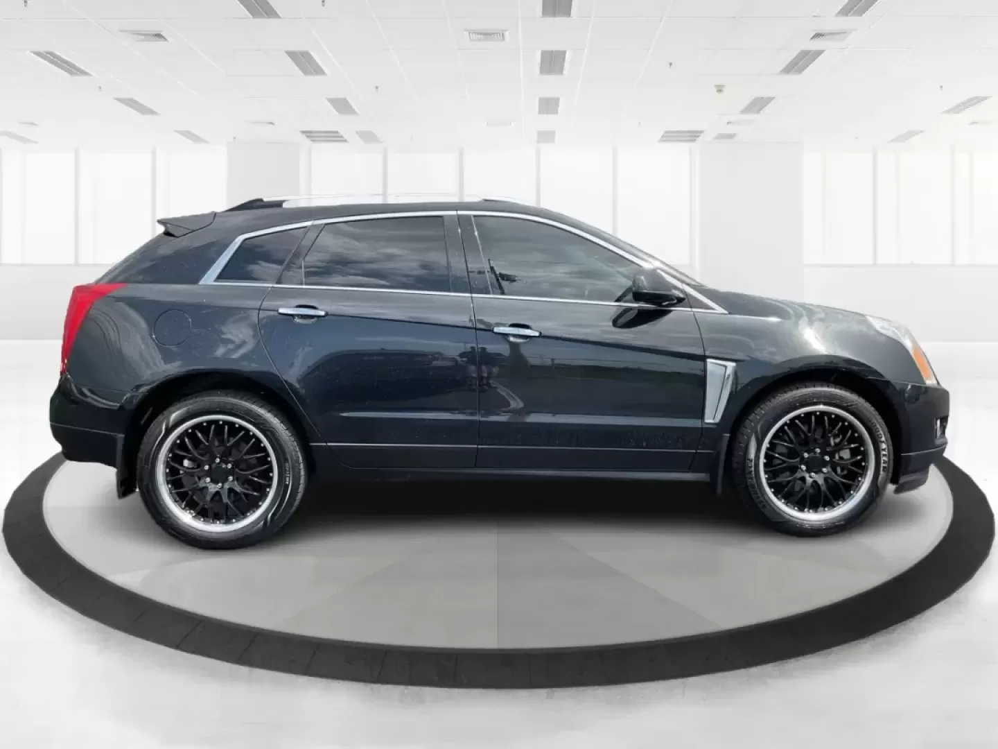 2013 Cadillac SRX Premium Collection (3GYFNJE34DS) with an 3.6L V-6 gasoline direct injection engine, located at 401 Woodman Dr, Riverside, OH, 45431, (937) 908-9800, 39.760899, -84.123421 - Photo#1