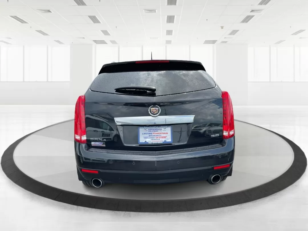 2013 Cadillac SRX Premium Collection (3GYFNJE34DS) with an 3.6L V-6 gasoline direct injection engine, located at 401 Woodman Dr, Riverside, OH, 45431, (937) 908-9800, 39.760899, -84.123421 - Photo#3