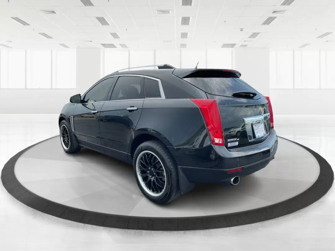 2013 Cadillac SRX Premium Collection (3GYFNJE34DS) with an 3.6L V-6 gasoline direct injection engine, located at 401 Woodman Dr, Riverside, OH, 45431, (937) 908-9800, 39.760899, -84.123421 - Photo#4
