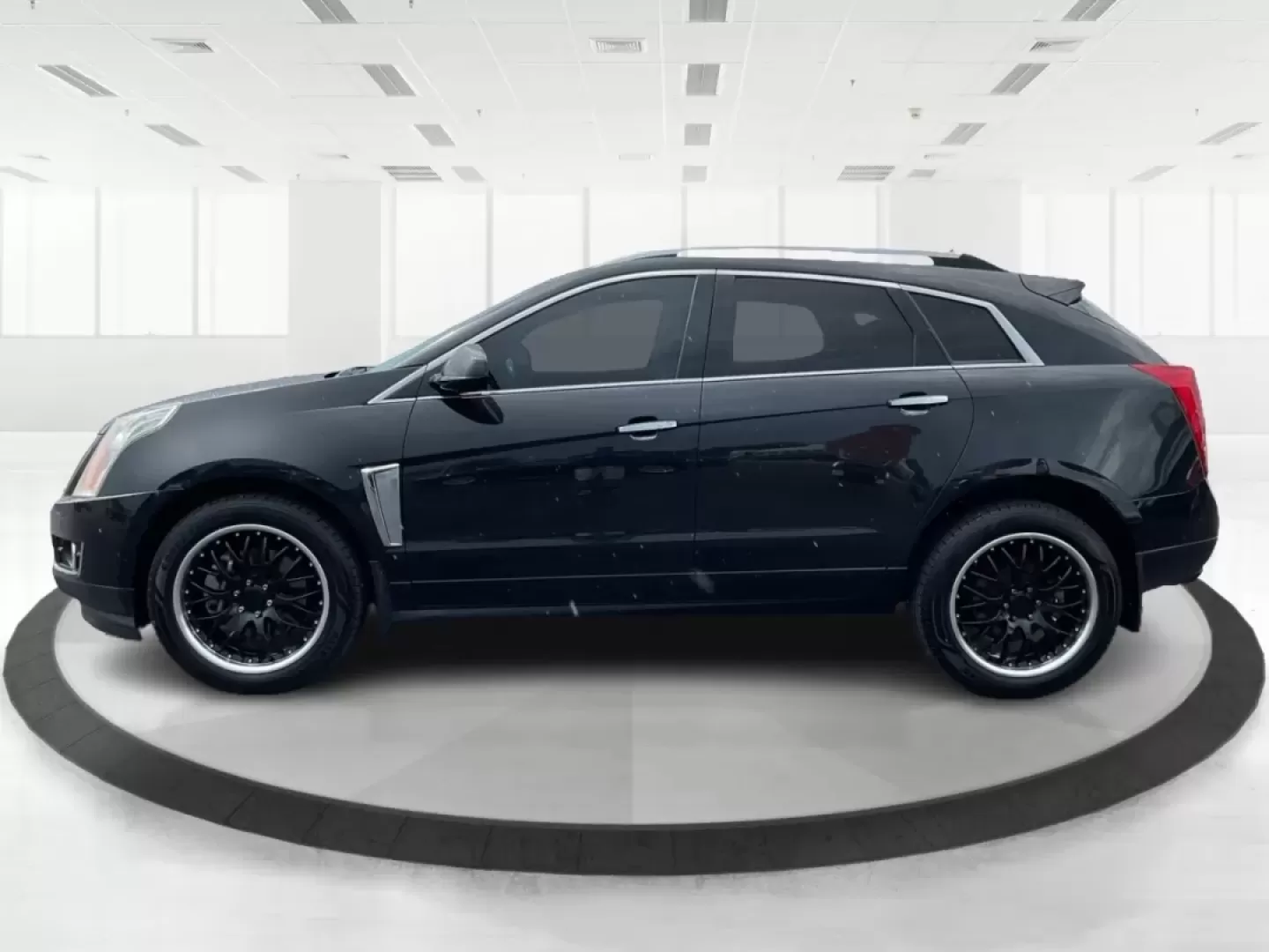 2013 Cadillac SRX Premium Collection (3GYFNJE34DS) with an 3.6L V-6 gasoline direct injection engine, located at 401 Woodman Dr, Riverside, OH, 45431, (937) 908-9800, 39.760899, -84.123421 - Photo#5