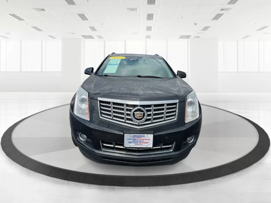 2013 Cadillac SRX Premium Collection (3GYFNJE34DS) with an 3.6L V-6 gasoline direct injection engine, located at 401 Woodman Dr, Riverside, OH, 45431, (937) 908-9800, 39.760899, -84.123421 - Photo#7