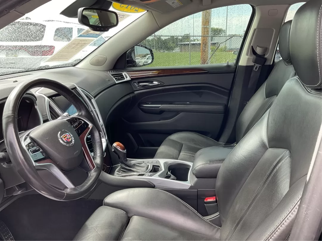 2013 Cadillac SRX Premium Collection (3GYFNJE34DS) with an 3.6L V-6 gasoline direct injection engine, located at 401 Woodman Dr, Riverside, OH, 45431, (937) 908-9800, 39.760899, -84.123421 - Photo#9