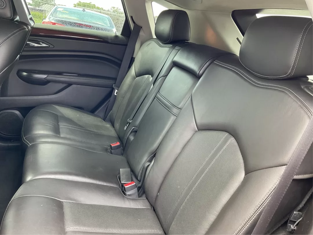 2013 Cadillac SRX Premium Collection (3GYFNJE34DS) with an 3.6L V-6 gasoline direct injection engine, located at 401 Woodman Dr, Riverside, OH, 45431, (937) 908-9800, 39.760899, -84.123421 - Photo#10