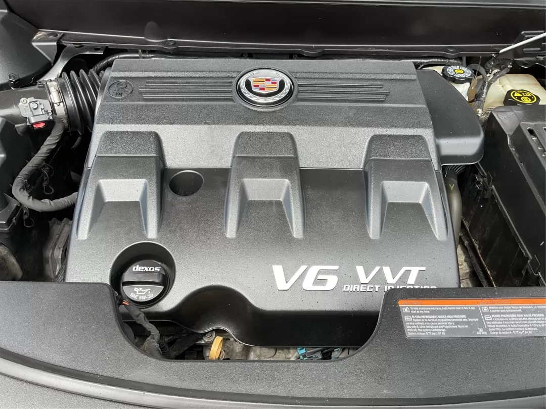 2013 Cadillac SRX Premium Collection (3GYFNJE34DS) with an 3.6L V-6 gasoline direct injection engine, located at 401 Woodman Dr, Riverside, OH, 45431, (937) 908-9800, 39.760899, -84.123421 - Photo#11