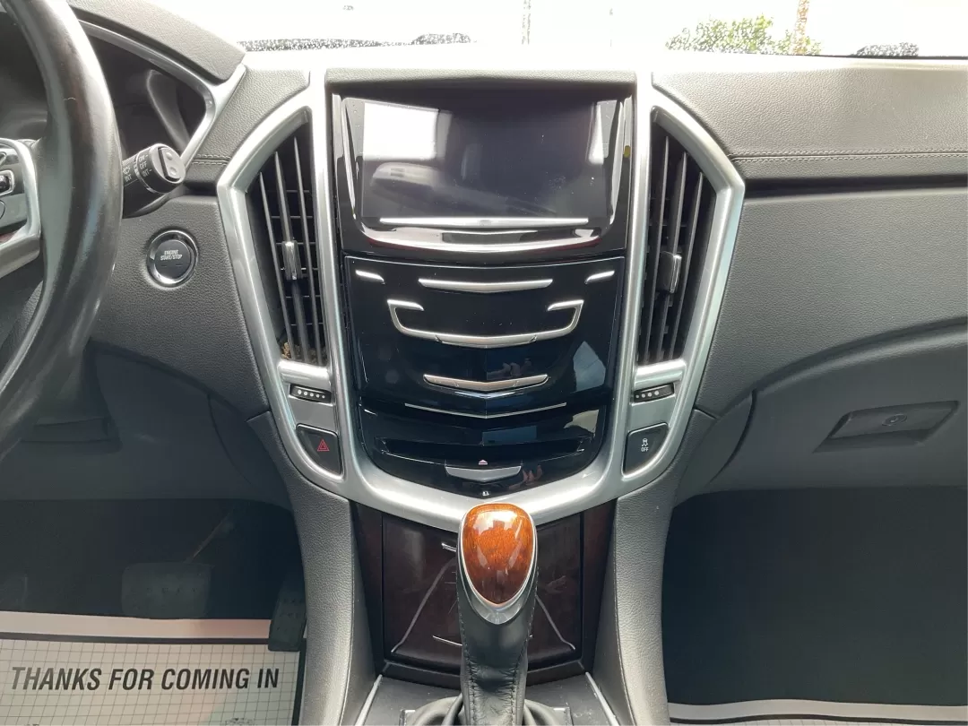 2013 Cadillac SRX Premium Collection (3GYFNJE34DS) with an 3.6L V-6 gasoline direct injection engine, located at 401 Woodman Dr, Riverside, OH, 45431, (937) 908-9800, 39.760899, -84.123421 - Photo#13