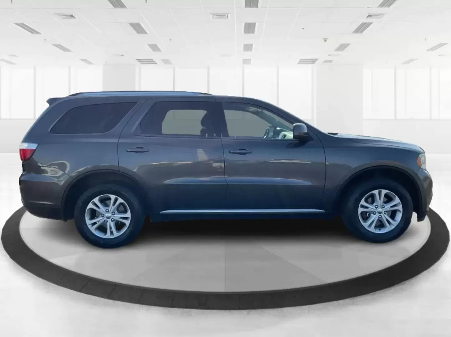 2013 Dodge Durango SXT (1C4RDJAG7DC) with an 3.6L V-6 DOHC engine, located at 8750 N County Rd 25A, Piqua, OH, 45356, (937) 908-9800, 40.164391, -84.232513 - Photo#1