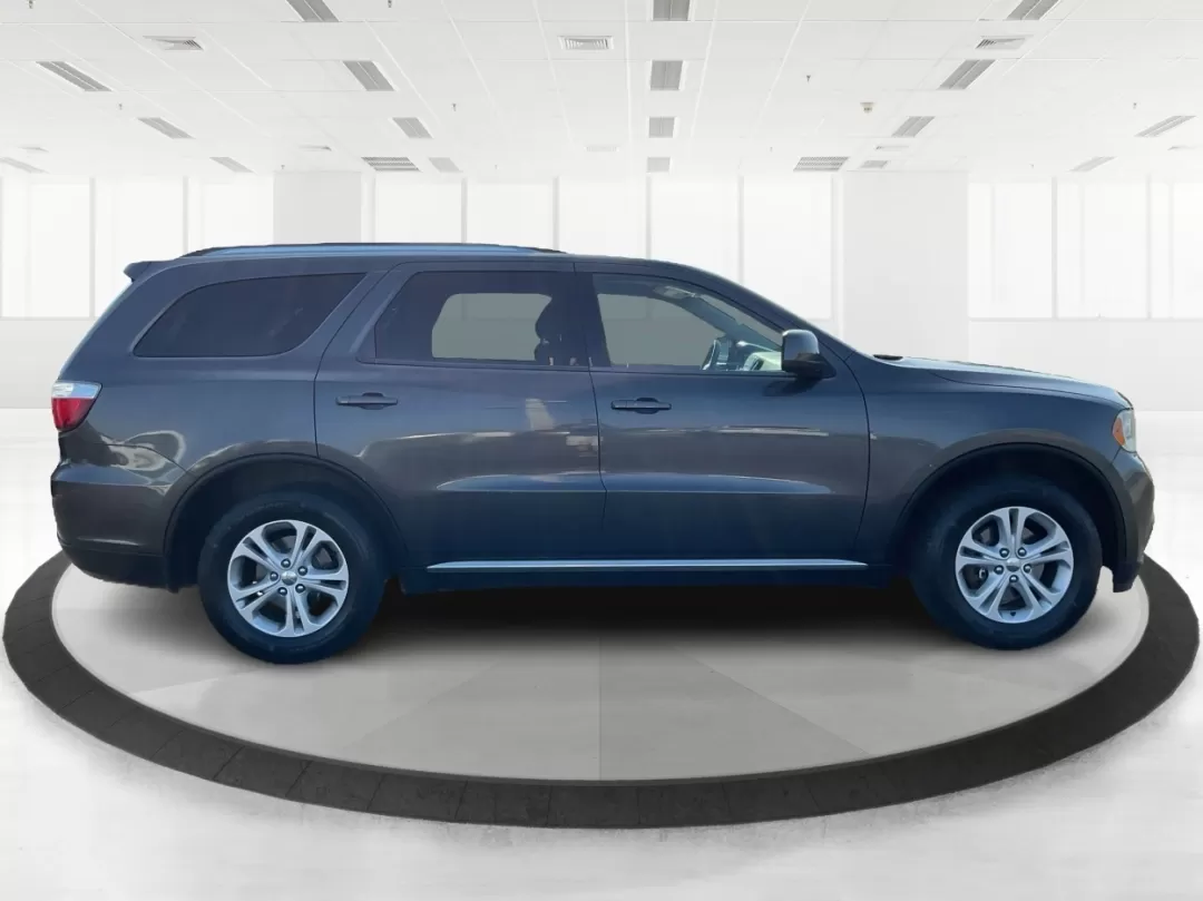 2013 Dodge Durango SXT (1C4RDJAG7DC) with an 3.6L V-6 DOHC engine, located at 1099 N County Rd 25A , Troy, OH, 45373, (937) 908-9800, 40.057079, -84.212883 - Photo#1