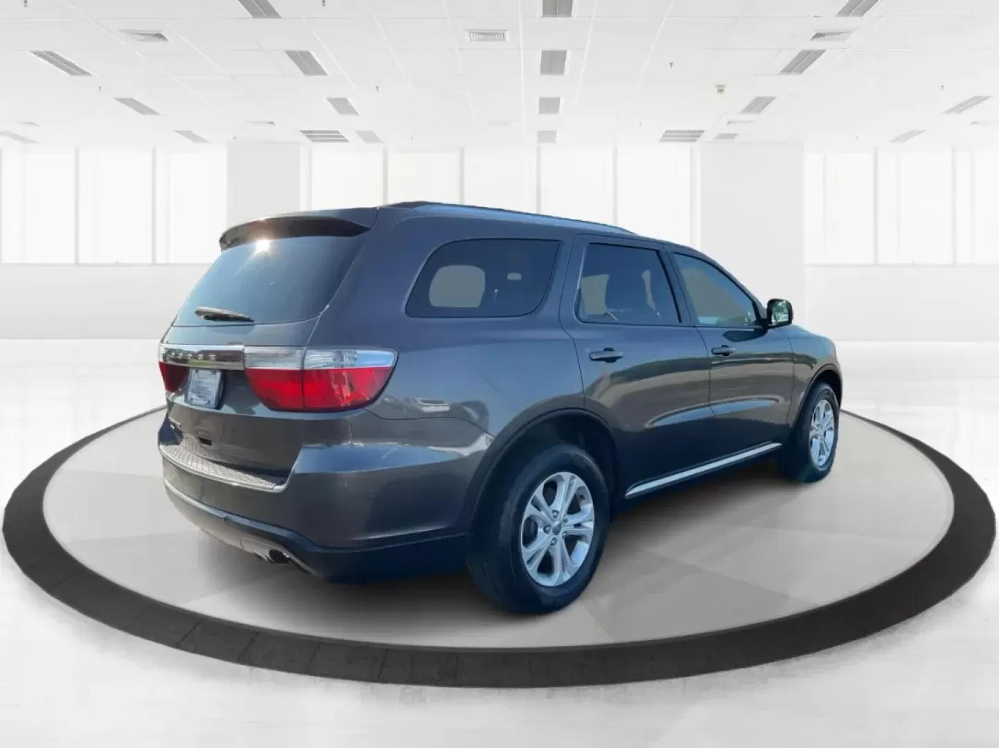 2013 Dodge Durango SXT (1C4RDJAG7DC) with an 3.6L V-6 DOHC engine, located at 8750 N County Rd 25A, Piqua, OH, 45356, (937) 908-9800, 40.164391, -84.232513 - Photo#2