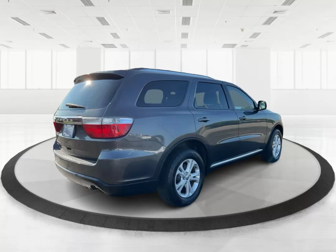 2013 Dodge Durango SXT (1C4RDJAG7DC) with an 3.6L V-6 DOHC engine, located at 1099 N County Rd 25A , Troy, OH, 45373, (937) 908-9800, 40.057079, -84.212883 - Photo#2