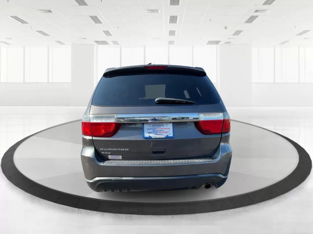 2013 Dodge Durango SXT (1C4RDJAG7DC) with an 3.6L V-6 DOHC engine, located at 1099 N County Rd 25A , Troy, OH, 45373, (937) 908-9800, 40.057079, -84.212883 - Photo#3