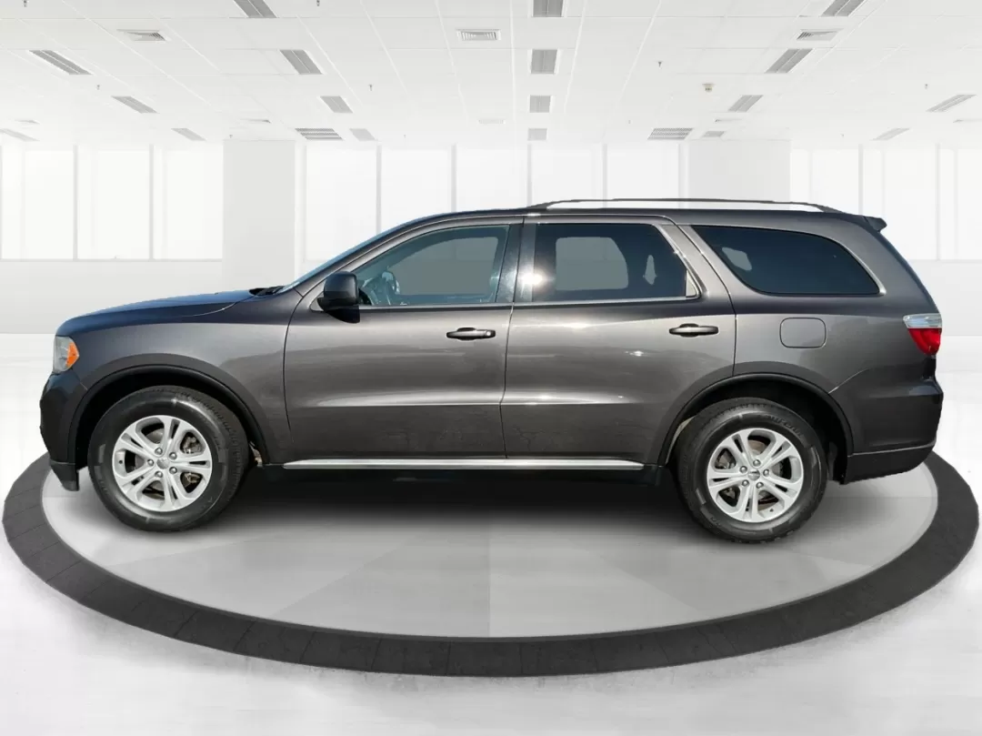 2013 Dodge Durango SXT (1C4RDJAG7DC) with an 3.6L V-6 DOHC engine, located at 1099 N County Rd 25A , Troy, OH, 45373, (937) 908-9800, 40.057079, -84.212883 - Photo#5