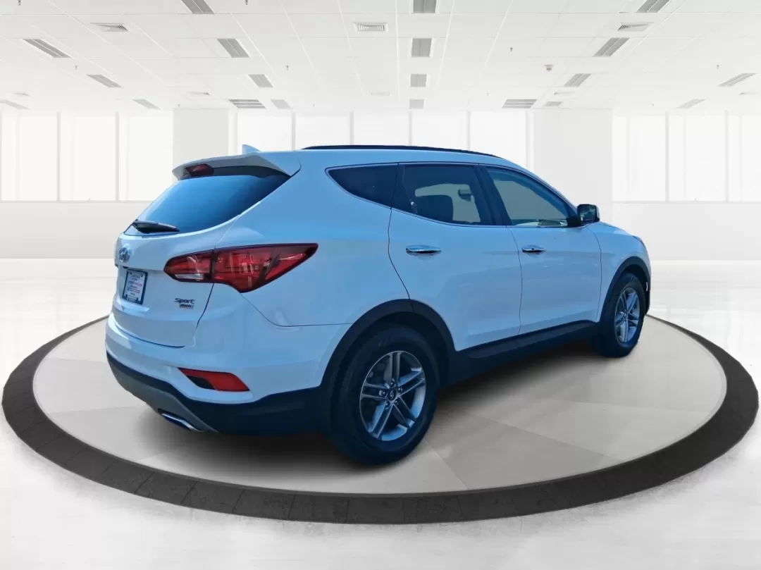 2018 Hyundai Santa Fe 2.4L (5NMZUDLB3JH) with an Theta II 2.4L I-4 gasoline direct injection engine, located at 880 E. National Road, Vandalia, OH, 45377, (937) 908-9800, 39.891918, -84.183594 - Photo#2