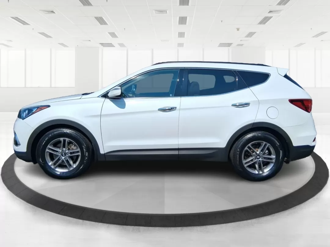2018 Hyundai Santa Fe 2.4L (5NMZUDLB3JH) with an Theta II 2.4L I-4 gasoline direct injection engine, located at 880 E. National Road, Vandalia, OH, 45377, (937) 908-9800, 39.891918, -84.183594 - Photo#5