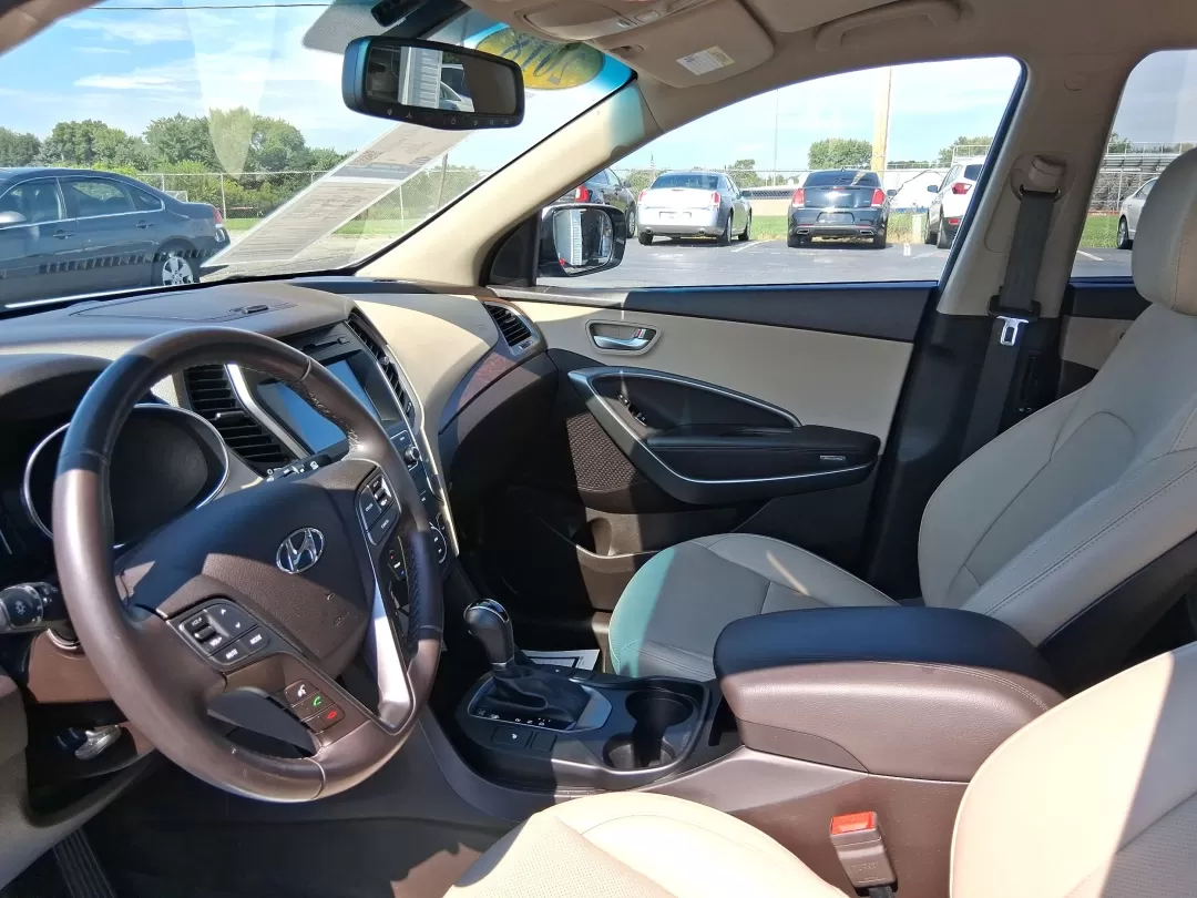 2018 Hyundai Santa Fe 2.4L (5NMZUDLB3JH) with an Theta II 2.4L I-4 gasoline direct injection engine, located at 880 E. National Road, Vandalia, OH, 45377, (937) 908-9800, 39.891918, -84.183594 - Photo#9