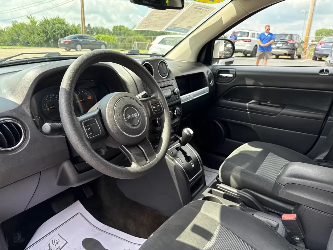 2016 Jeep Compass Sport (1C4NJDBB5GD) with an 2.4L I-4 DOHC engine, located at 1099 N County Rd 25A , Troy, OH, 45373, (937) 908-9800, 40.057079, -84.212883 - Photo#9