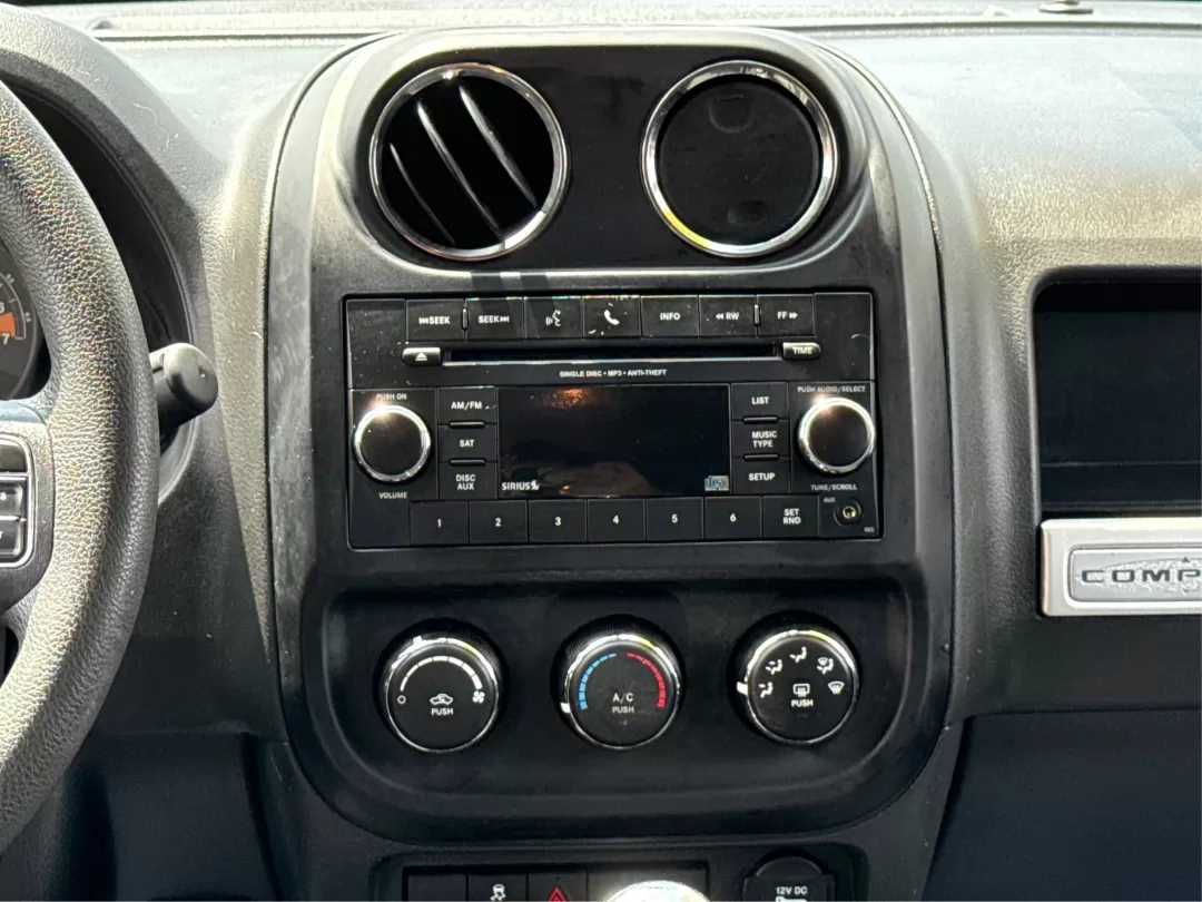 2016 Jeep Compass Sport (1C4NJDBB5GD) with an 2.4L I-4 DOHC engine, located at 1099 N County Rd 25A , Troy, OH, 45373, (937) 908-9800, 40.057079, -84.212883 - Photo#13