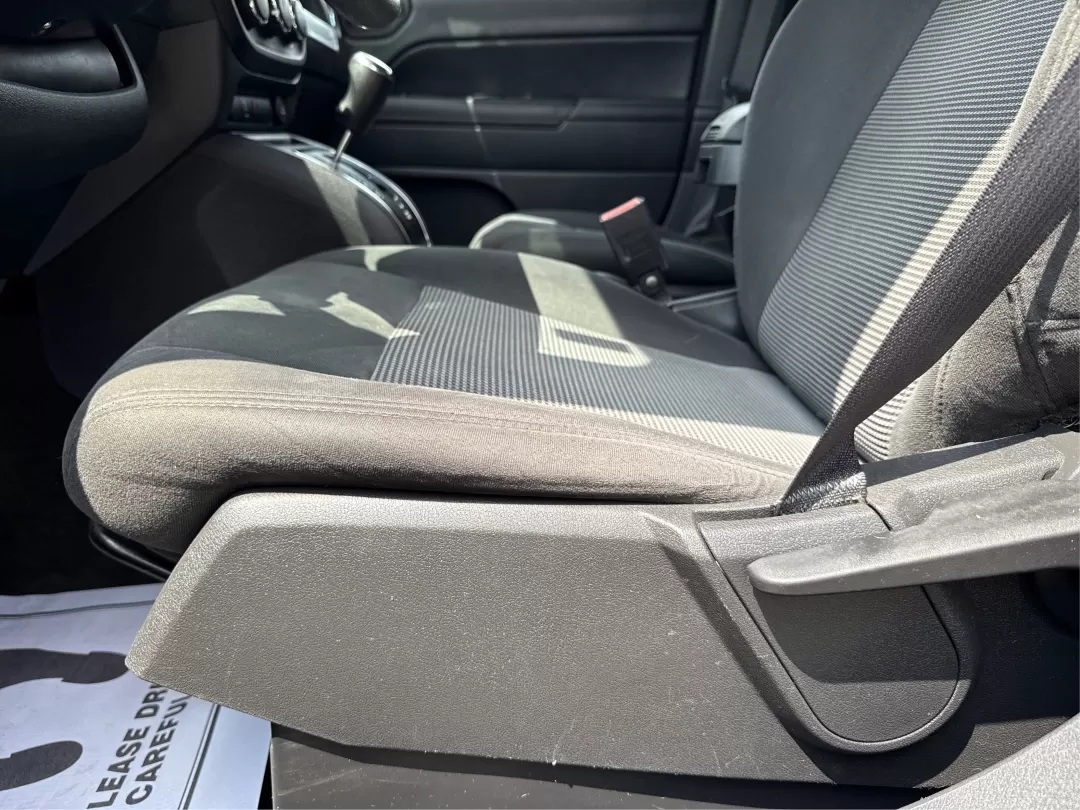2016 Jeep Compass Sport (1C4NJDBB5GD) with an 2.4L I-4 DOHC engine, located at 1099 N County Rd 25A , Troy, OH, 45373, (937) 908-9800, 40.057079, -84.212883 - Photo#18