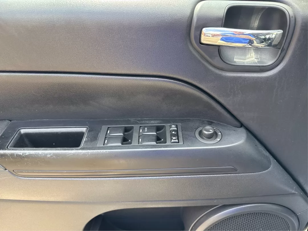2016 Jeep Compass Sport (1C4NJDBB5GD) with an 2.4L I-4 DOHC engine, located at 1099 N County Rd 25A , Troy, OH, 45373, (937) 908-9800, 40.057079, -84.212883 - Photo#19