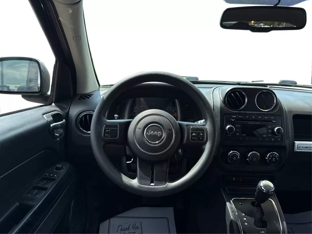 2016 Jeep Compass Sport (1C4NJDBB5GD) with an 2.4L I-4 DOHC engine, located at 1099 N County Rd 25A , Troy, OH, 45373, (937) 908-9800, 40.057079, -84.212883 - Photo#21