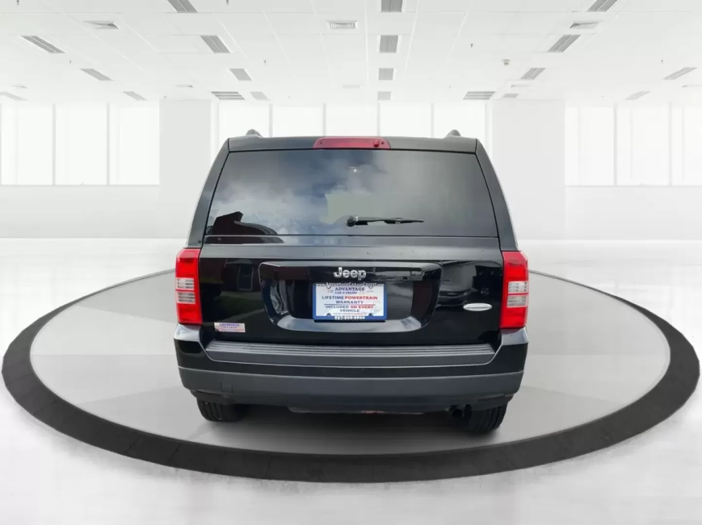 2014 Jeep Patriot Latitude (1C4NJPFA4ED) with an Other engine, located at 4508 South Dixie Dr, Moraine, OH, 45439, (937) 908-9800, 39.689976, -84.218452 - Photo#3