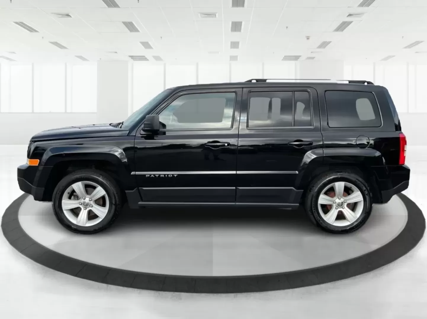 2014 Jeep Patriot Latitude (1C4NJPFA4ED) with an Other engine, located at 4508 South Dixie Dr, Moraine, OH, 45439, (937) 908-9800, 39.689976, -84.218452 - Photo#5