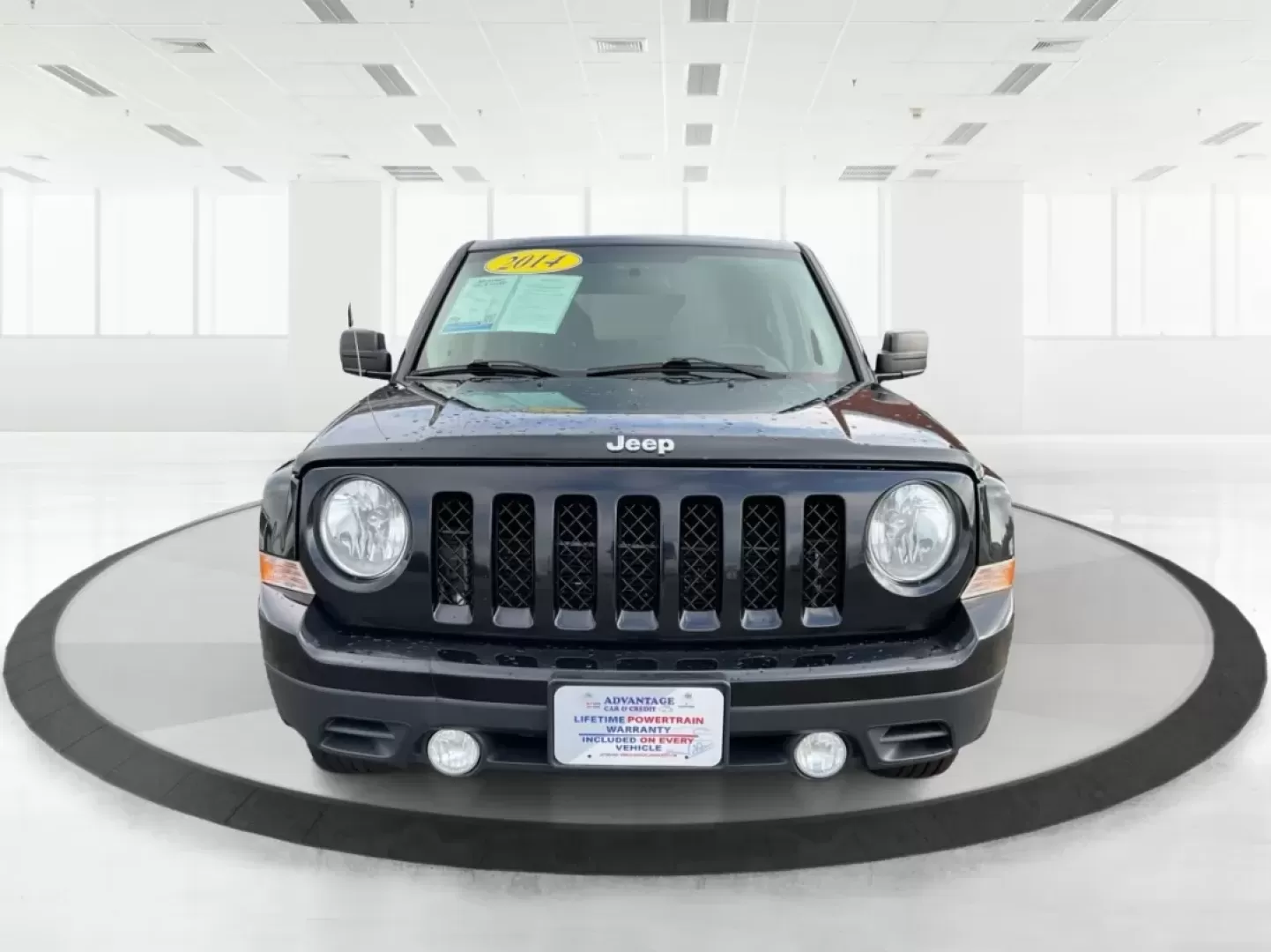 2014 Jeep Patriot Latitude (1C4NJPFA4ED) with an Other engine, located at 4508 South Dixie Dr, Moraine, OH, 45439, (937) 908-9800, 39.689976, -84.218452 - Photo#7