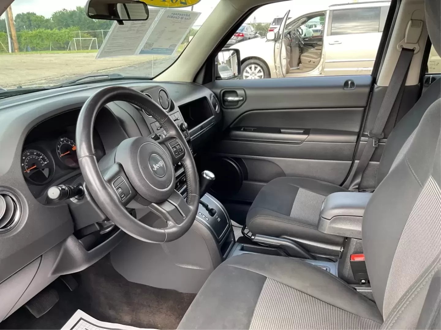 2014 Jeep Patriot Latitude (1C4NJPFA4ED) with an Other engine, located at 4508 South Dixie Dr, Moraine, OH, 45439, (937) 908-9800, 39.689976, -84.218452 - Photo#9
