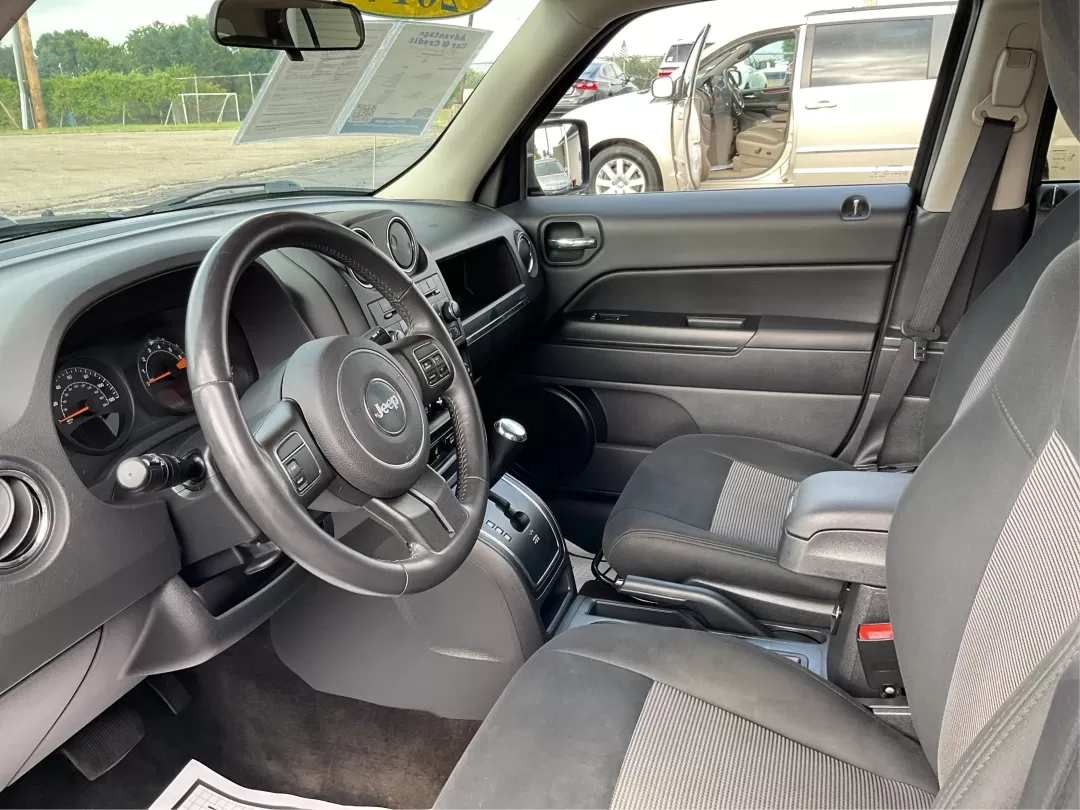 2014 Jeep Patriot Latitude (1C4NJPFA4ED) with an Other engine, located at 4508 South Dixie Dr, Moraine, OH, 45439, (937) 908-9800, 39.689976, -84.218452 - Photo#9