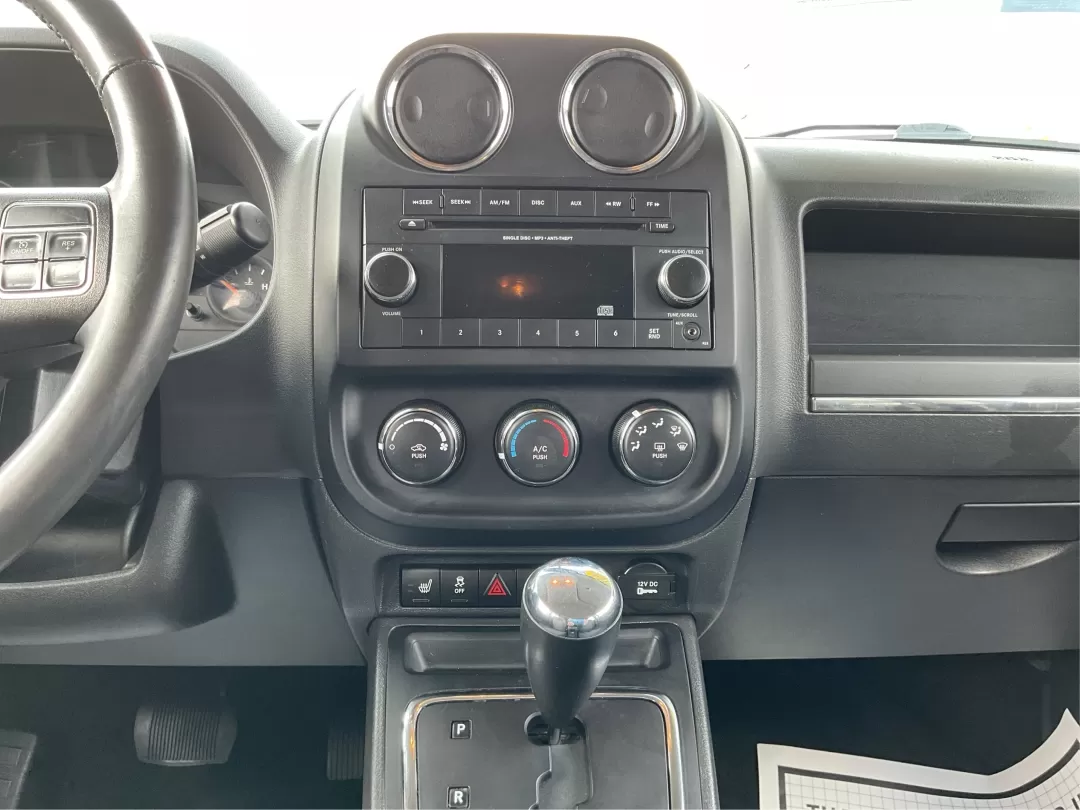 2014 Jeep Patriot Latitude (1C4NJPFA4ED) with an Other engine, located at 4508 South Dixie Dr, Moraine, OH, 45439, (937) 908-9800, 39.689976, -84.218452 - Photo#12