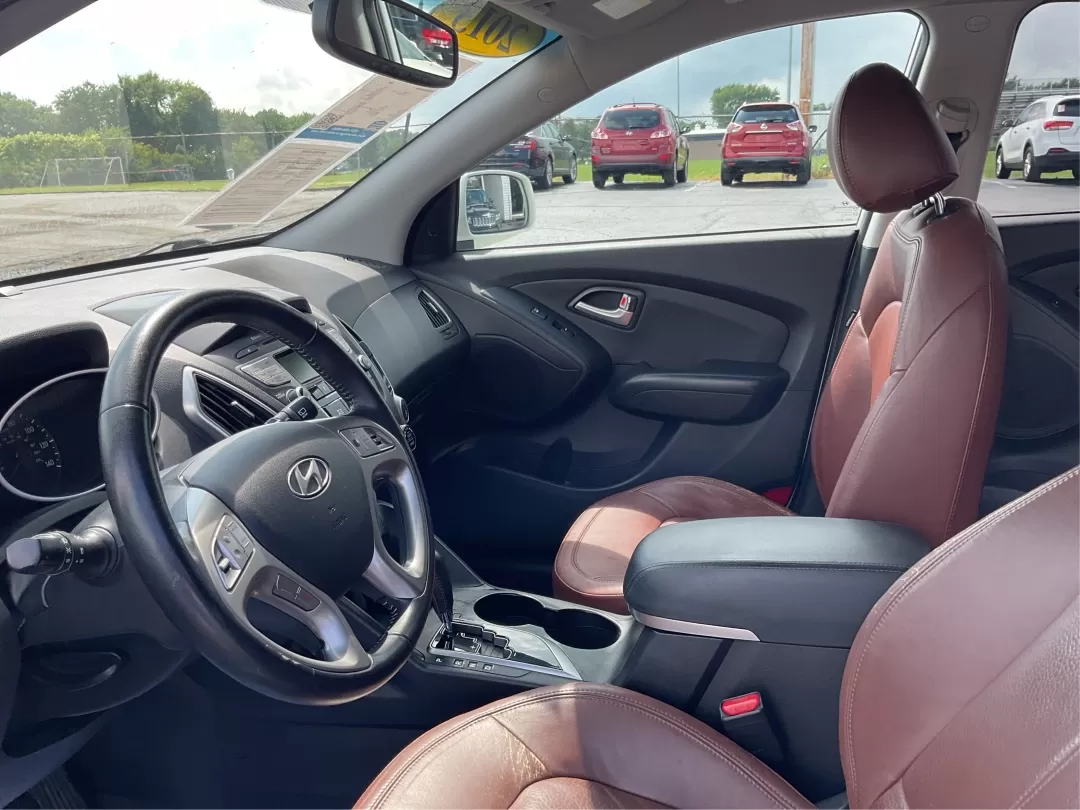 2013 Hyundai Tucson Limited (KM8JU3AC4DU) with an Other engine, located at 1951 S Dayton Lakeview Rd., New Carlisle, OH, 45344, (937) 908-9800, 39.890999, -84.050255 - 2013 Hyundai Tucson Limited - Photo#9