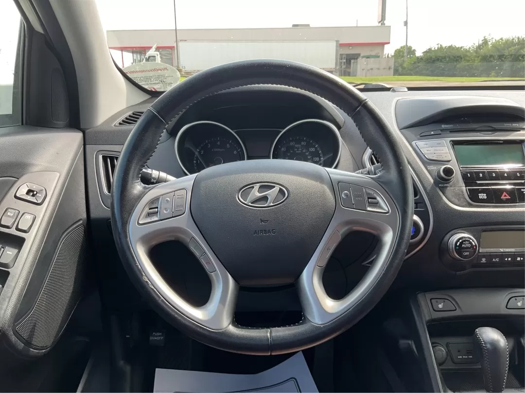 2013 Hyundai Tucson Limited (KM8JU3AC4DU) with an Other engine, located at 1951 S Dayton Lakeview Rd., New Carlisle, OH, 45344, (937) 908-9800, 39.890999, -84.050255 - 2013 Hyundai Tucson Limited - Photo#16