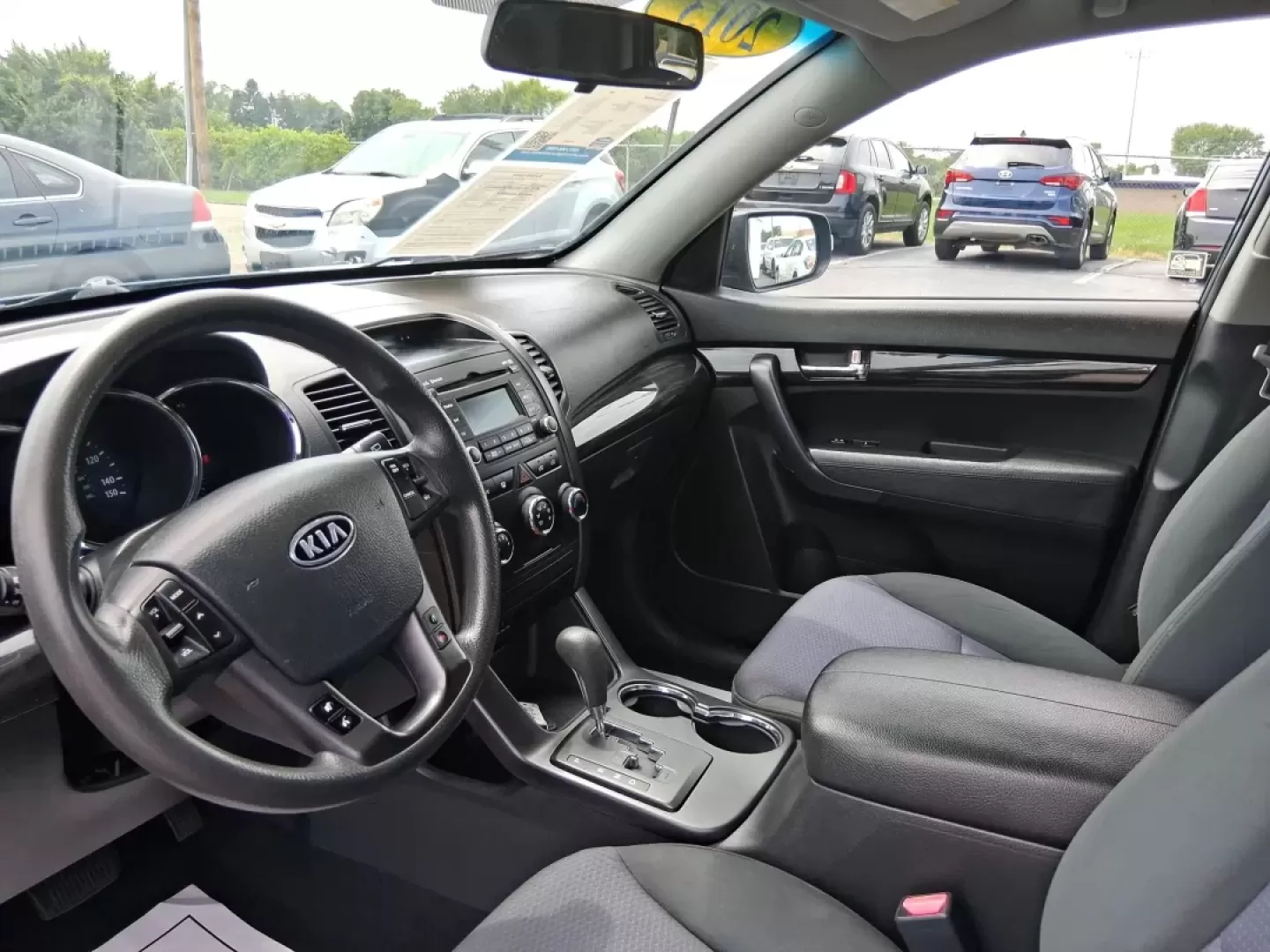 2013 Kia Sorento LX 4WD (5XYKTCA69DG) with an 2.4L L4 DOHC 16V engine, 6-Speed Automatic transmission, located at 1184 Kauffman Ave, Fairborn, OH, 45324, (937) 908-9800, 39.807072, -84.030914 - **Adventure Awaits with the 2013 Kia Sorento LX 4WD at Advantage Car and Credit - Fairborn!**<br /> <br /> Are you ready to elevate your family adventures or make your daily commute incredibly comfortable? Look no further than this spacious and versatile 2013 Kia Sorento LX 4WD, perfect for growing - Photo#9
