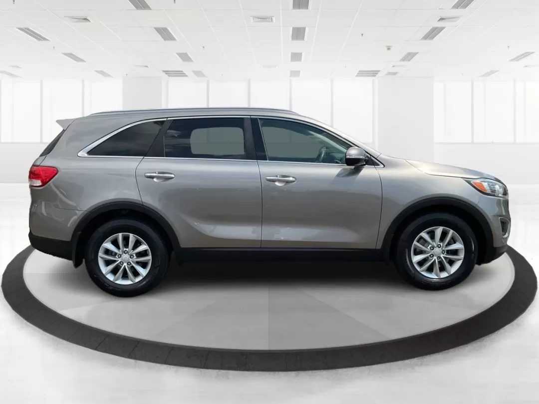 2016 Kia Sorento 2.4L LX (5XYPG4A34GG) with an 2.4L I-4 gasoline direct injection engine, located at 401 Woodman Dr, Riverside, OH, 45431, (937) 908-9800, 39.760899, -84.123421 - **Explore Life's Adventures with the 2016 Kia Sorento at Advantage Car and Credit - Riverside!**<br /> <br /> Are you ready to elevate your driving experience? The 2016 Kia Sorento is the perfect companion for families, adventurers, and daily commuters alike. This versatile SUV seamlessly blends com - Photo#1