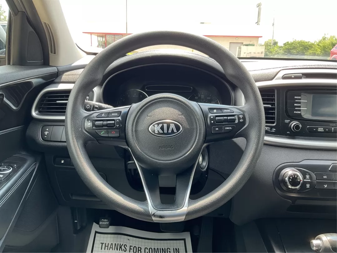 2016 Kia Sorento 2.4L LX (5XYPG4A34GG) with an 2.4L I-4 gasoline direct injection engine, located at 401 Woodman Dr, Riverside, OH, 45431, (937) 908-9800, 39.760899, -84.123421 - **Explore Life's Adventures with the 2016 Kia Sorento at Advantage Car and Credit - Riverside!**<br /> <br /> Are you ready to elevate your driving experience? The 2016 Kia Sorento is the perfect companion for families, adventurers, and daily commuters alike. This versatile SUV seamlessly blends com - Photo#16