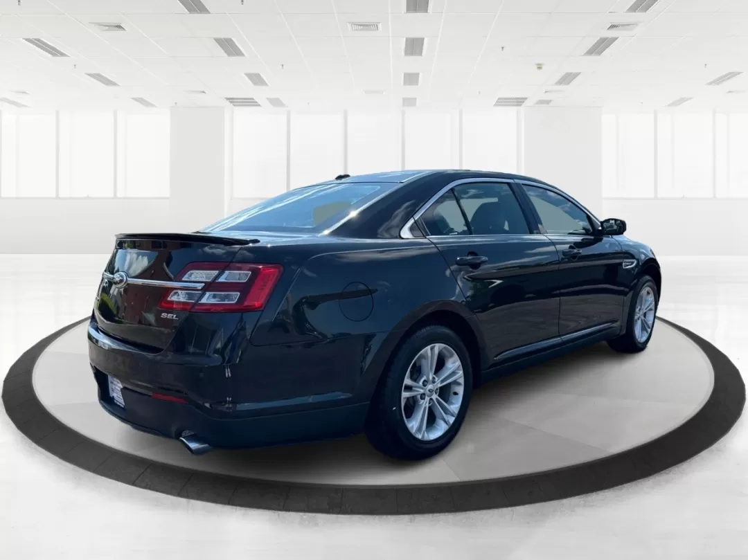 2013 Ford Taurus SEL (1FAHP2E87DG) with an EcoBoost 2L I-4 gasoline direct injection engine, located at 1099 N County Rd 25A , Troy, OH, 45373, (937) 908-9800, 40.057079, -84.212883 - 2013 Ford Taurus SEL - Photo#2