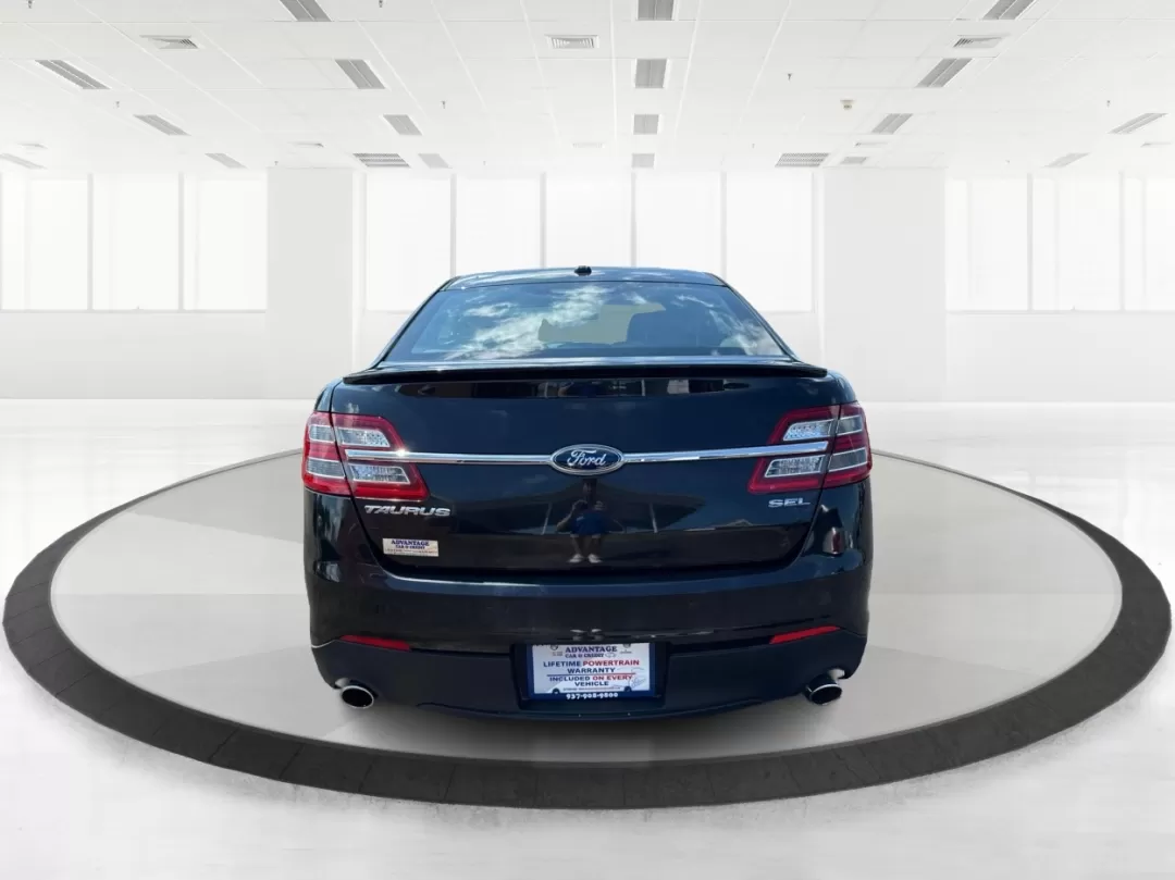 2013 Ford Taurus SEL (1FAHP2E87DG) with an EcoBoost 2L I-4 gasoline direct injection engine, located at 1099 N County Rd 25A , Troy, OH, 45373, (937) 908-9800, 40.057079, -84.212883 - 2013 Ford Taurus SEL - Photo#3