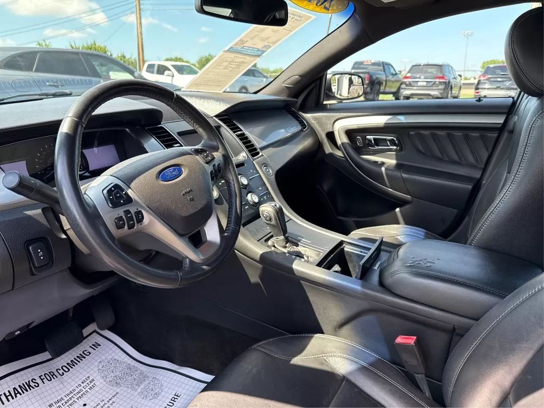 2013 Ford Taurus SEL (1FAHP2E87DG) with an EcoBoost 2L I-4 gasoline direct injection engine, located at 1099 N County Rd 25A , Troy, OH, 45373, (937) 908-9800, 40.057079, -84.212883 - 2013 Ford Taurus SEL - Photo#9