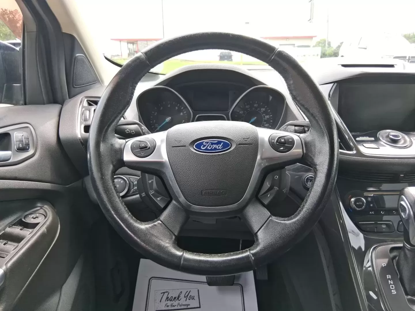 2014 Ford Escape Titanium (1FMCU9J96EU) with an EcoBoost 1.6L I-4 gasoline direct injection engine, located at 4508 South Dixie Dr, Moraine, OH, 45439, (937) 908-9800, 39.689976, -84.218452 - **Unleash Adventure with the 2014 Ford Escape Titanium: Your Ideal Family SUV!**<br /> <br /> Are you ready to take on the open road for your next family getaway or weekend adventure? Look no further than the 2014 Ford Escape Titanium, a versatile SUV that combines style, comfort, and functionality, - Photo#16