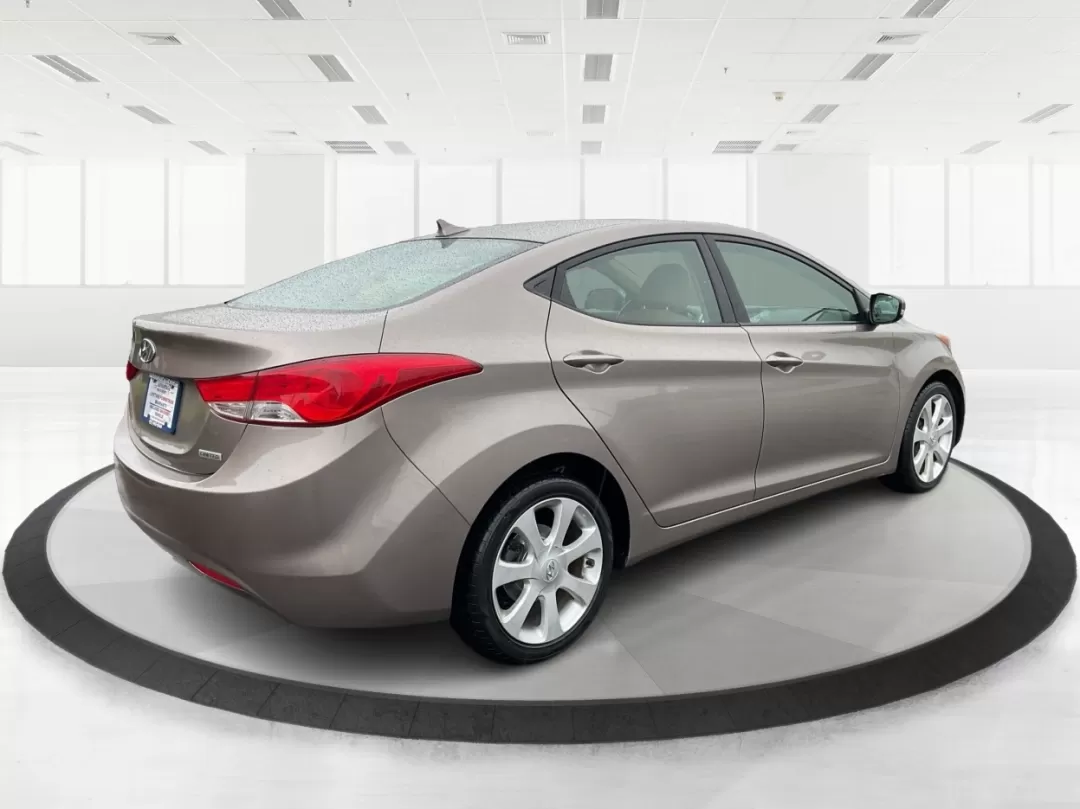 2012 Hyundai Elantra Limited (5NPDH4AE8CH) with an 1.8L I-4 DOHC engine, located at 401 Woodman Dr, Riverside, OH, 45431, (937) 908-9800, 39.760899, -84.123421 - 2012 Hyundai Elantra Limited - Photo#2
