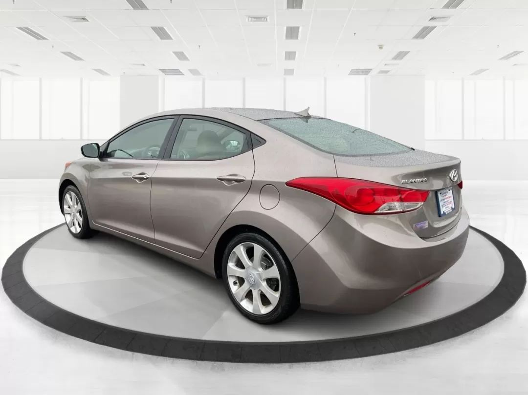 2012 Hyundai Elantra Limited (5NPDH4AE8CH) with an 1.8L I-4 DOHC engine, located at 401 Woodman Dr, Riverside, OH, 45431, (937) 908-9800, 39.760899, -84.123421 - 2012 Hyundai Elantra Limited - Photo#4